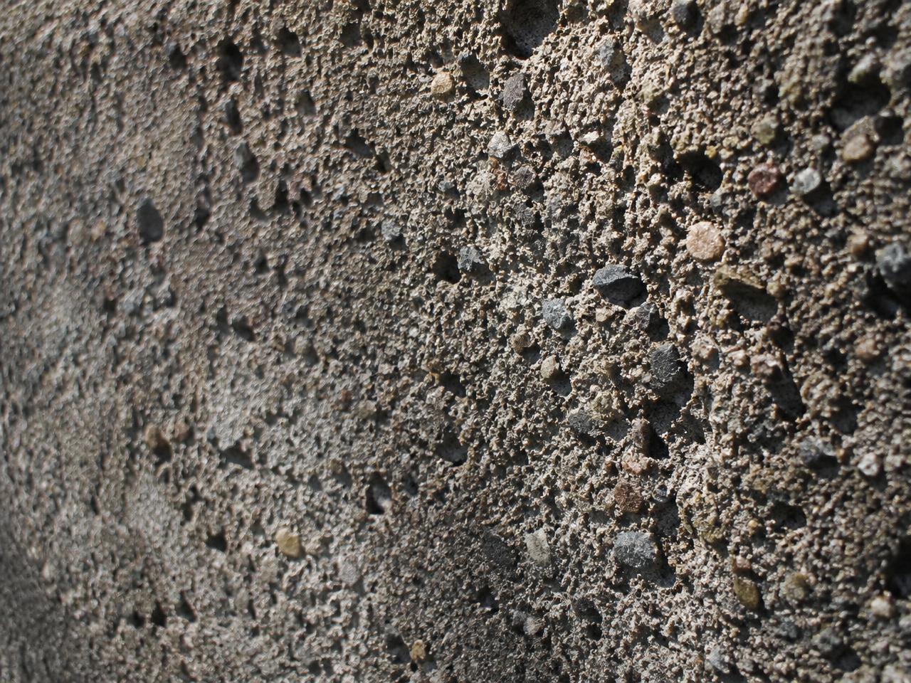 Heavy-Duty Guard Walls & Retaining Barriers — Close-up · heavy cast concrete